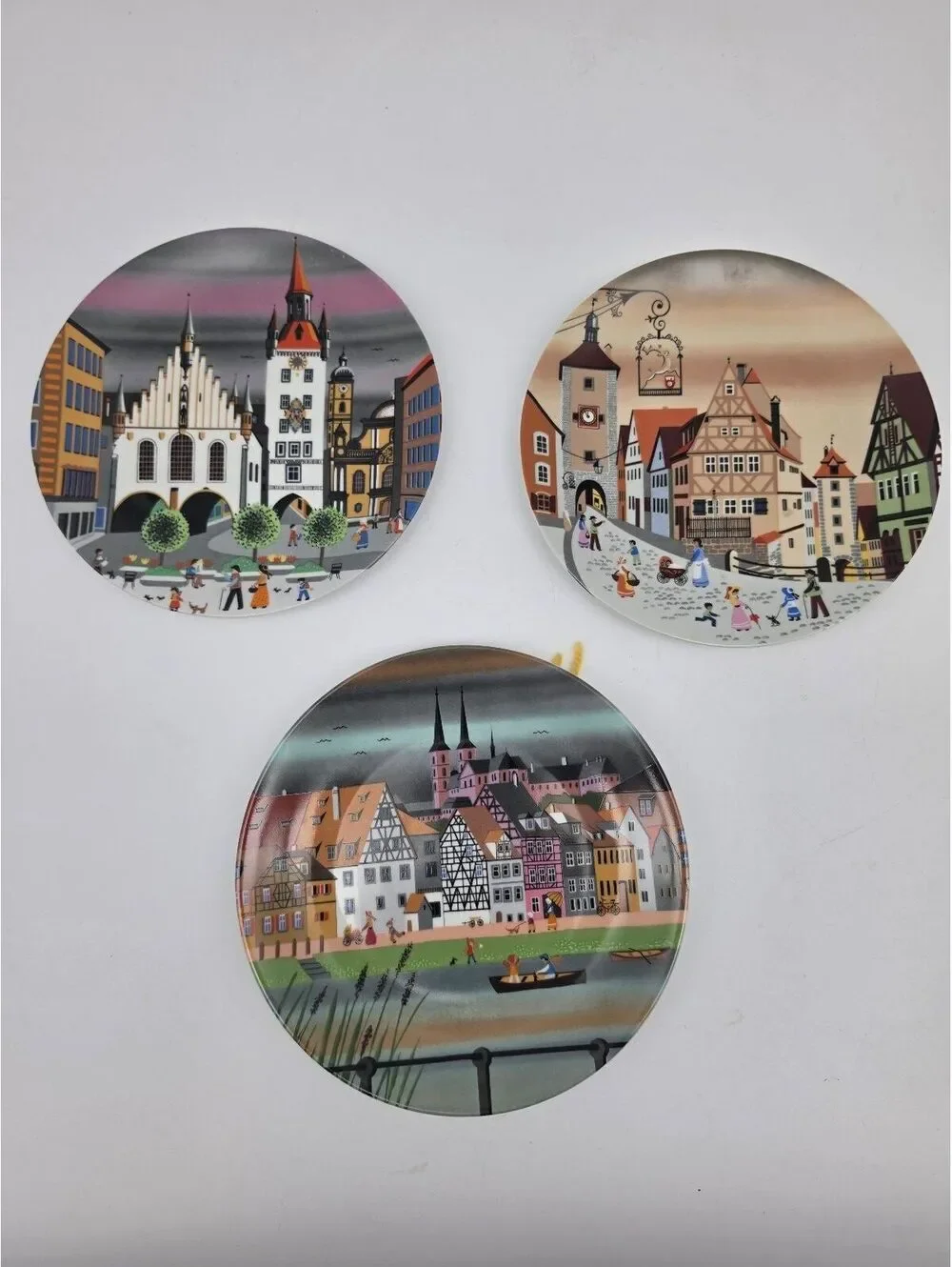 Set of 3 Jaeger & Co. Porcelain Plates Featuring Bavarian Town Scenes